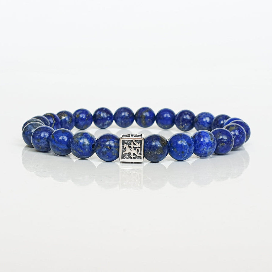 Lazurite bracelet for men with Vytis silver 925 charm, Blue beaded bracelet with a silver clasp on a white background