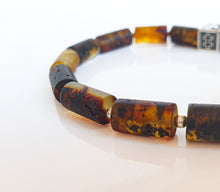 Load image into Gallery viewer, Close-up of a tortoiseshell beaded bracelet on a white background